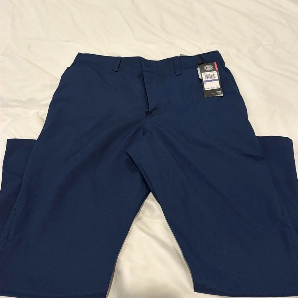 NWT. UNDER ARMOUR BOYS GOLF PANTS. NAVY. SIZE 18